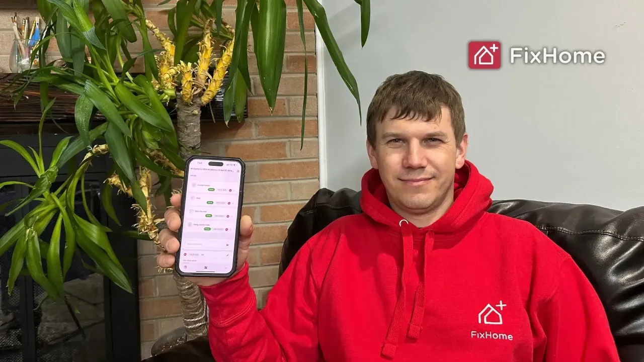 FixHome+ founder Roman shows the completed tasks in the app