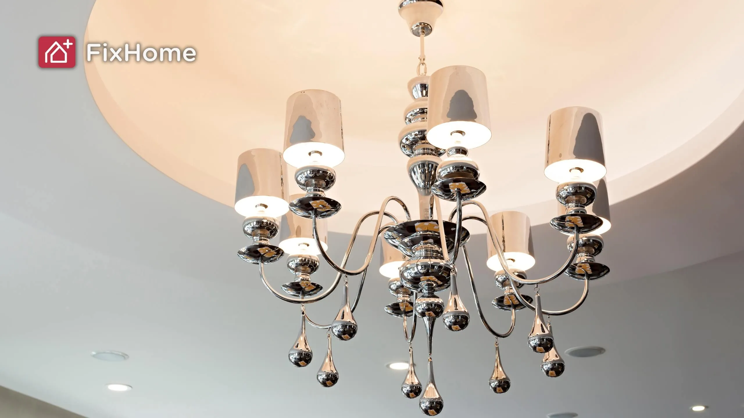Elegant chandelier, multiple lights, modern design.