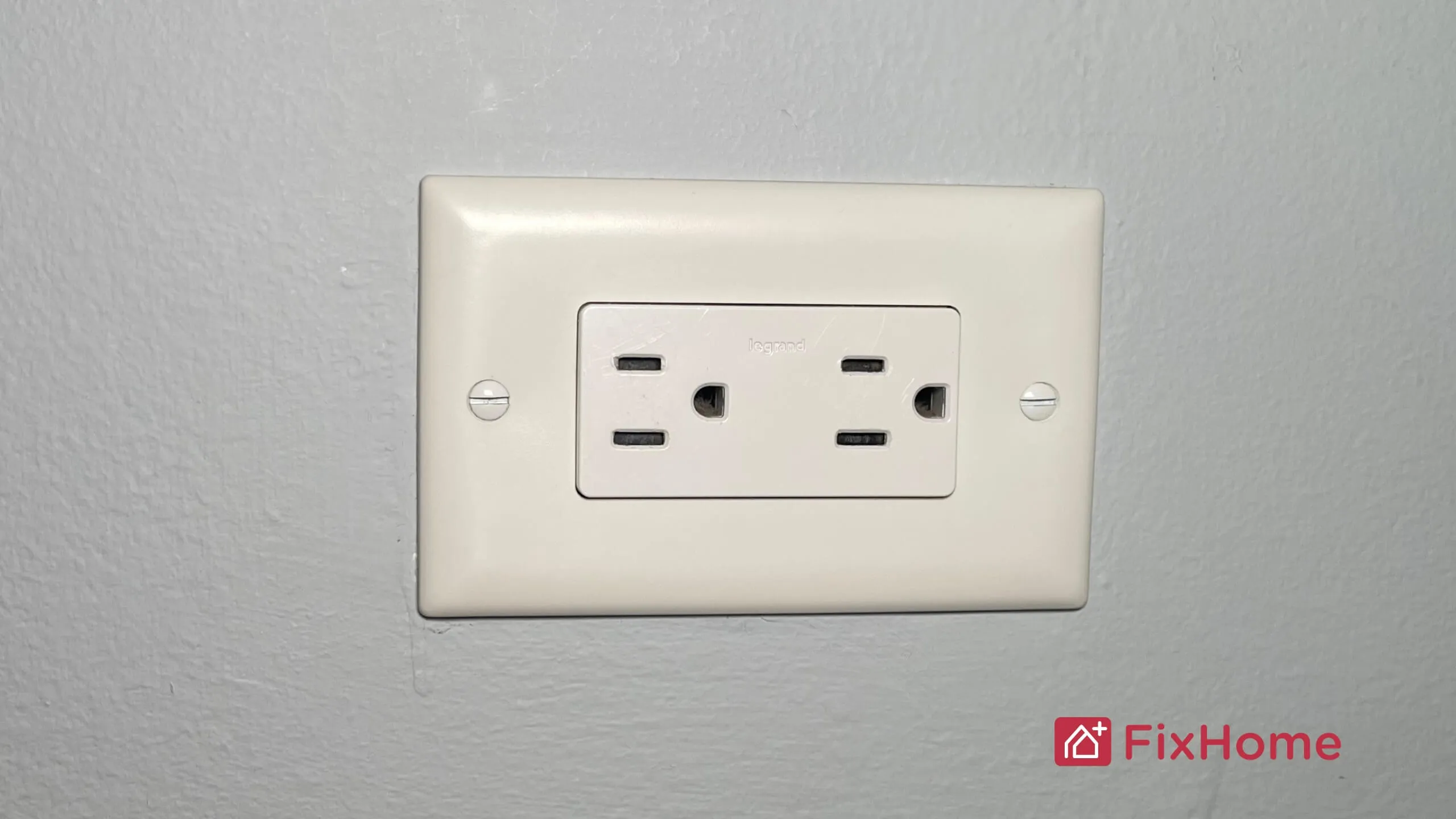 Wall outlet with two slots