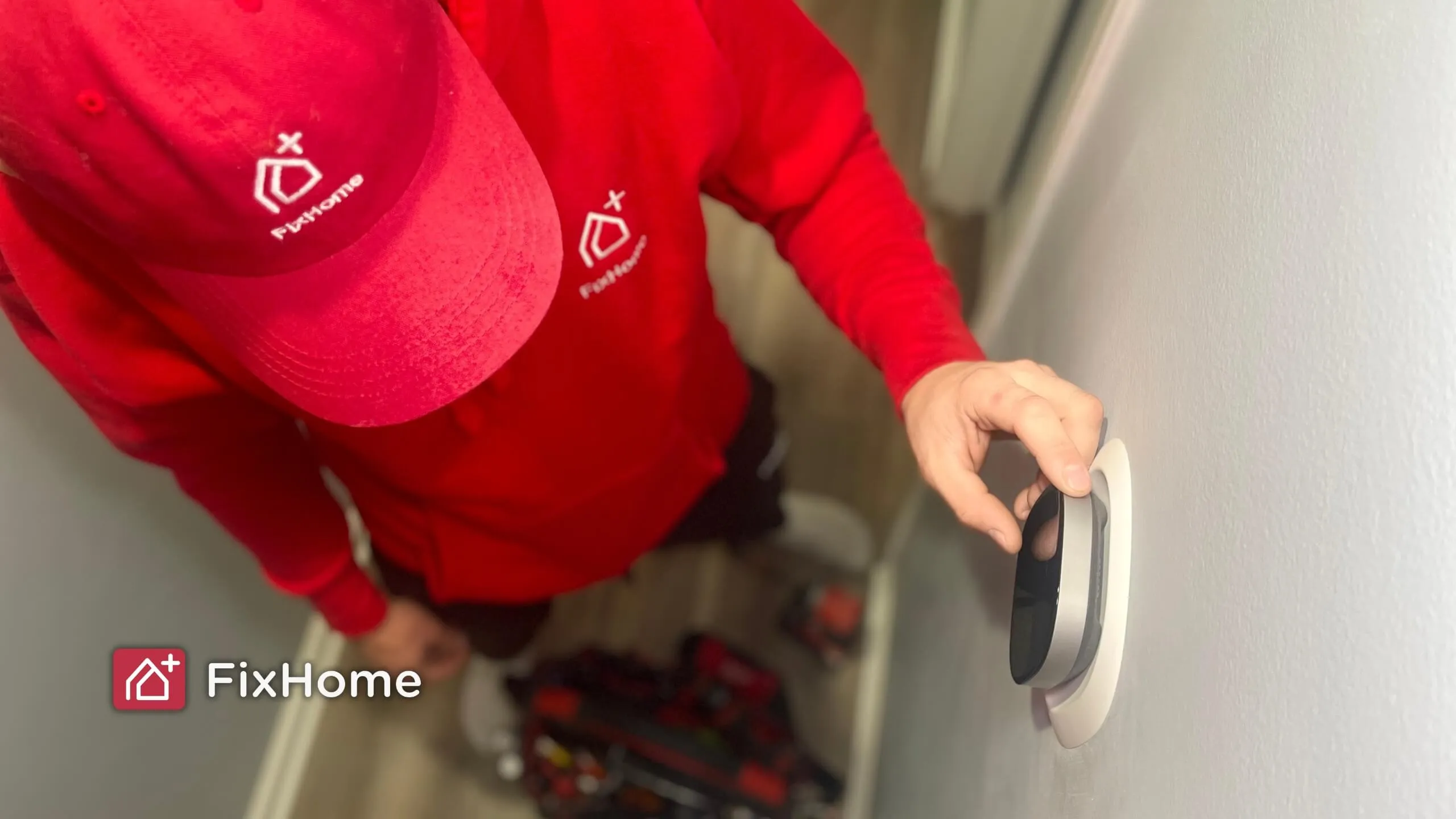 Handyman set up new smart thermostat