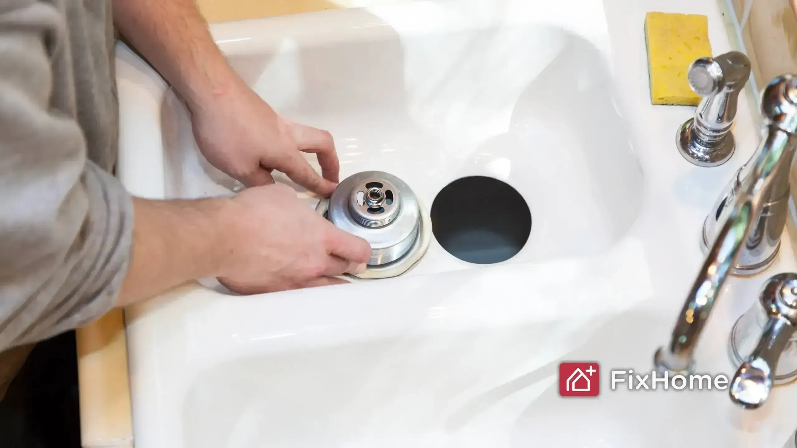 Installing a sink flange for a garbage disposal.