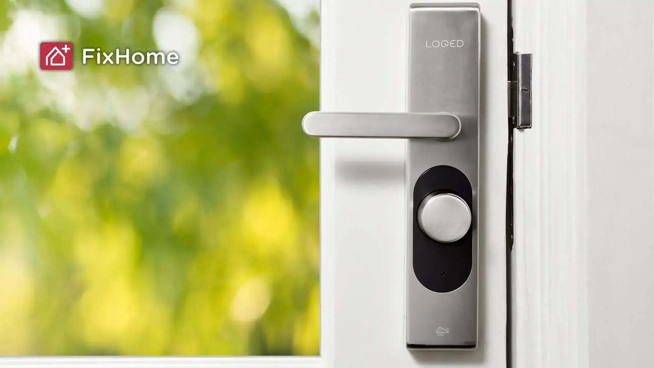 A close up of a smart lock handle on a white door