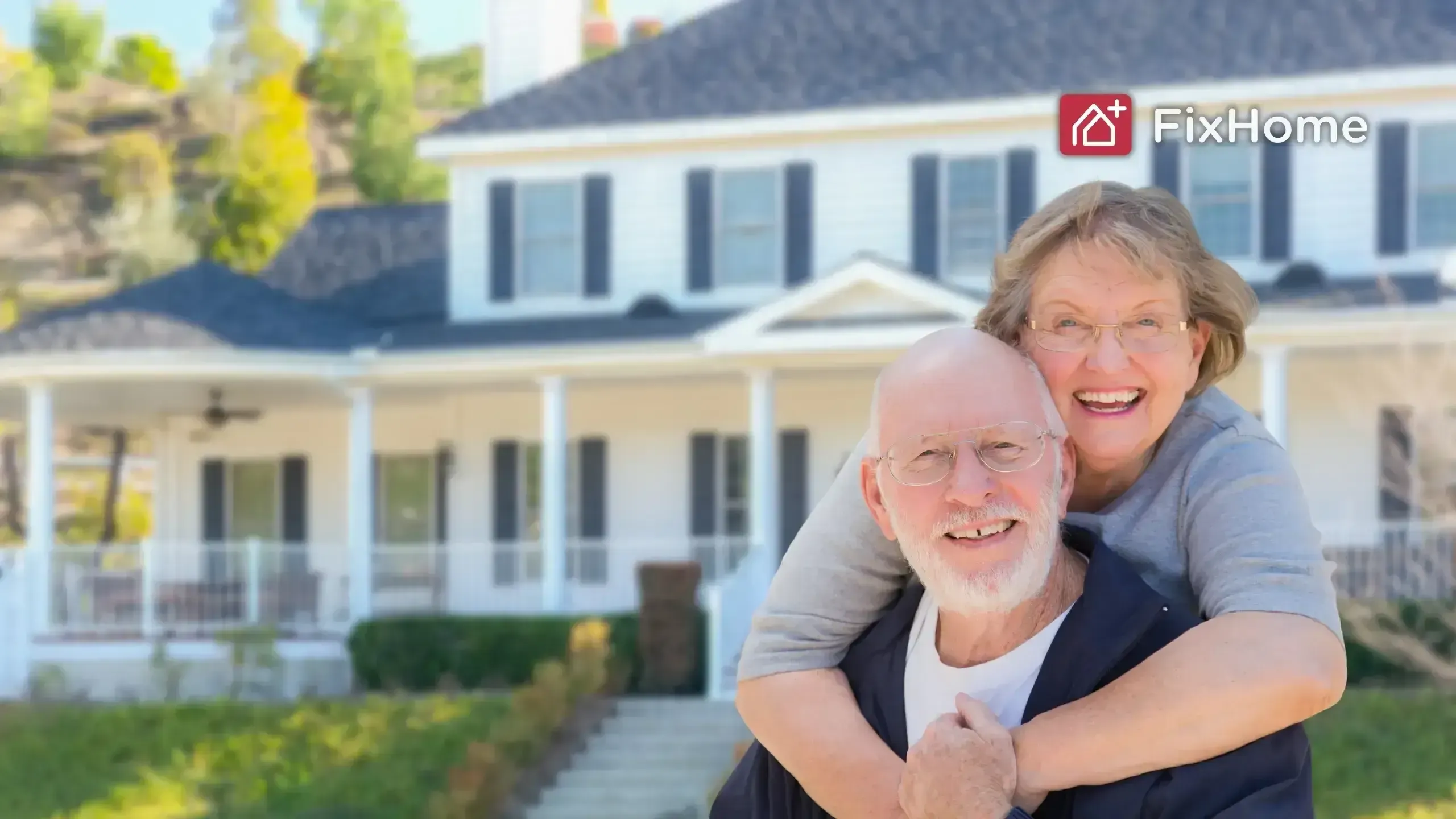 Home modification - A couple in front of a big house