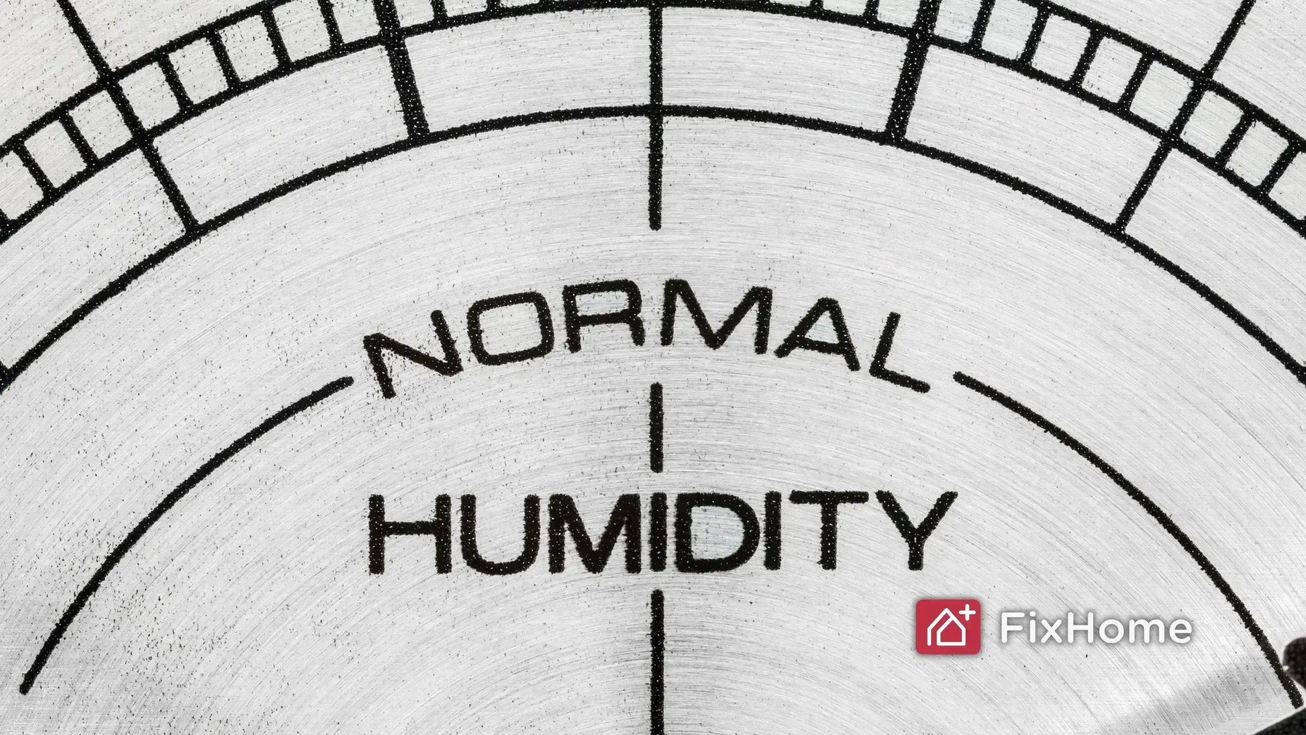 Close-up of a humidity gauge dial showing a normal reading