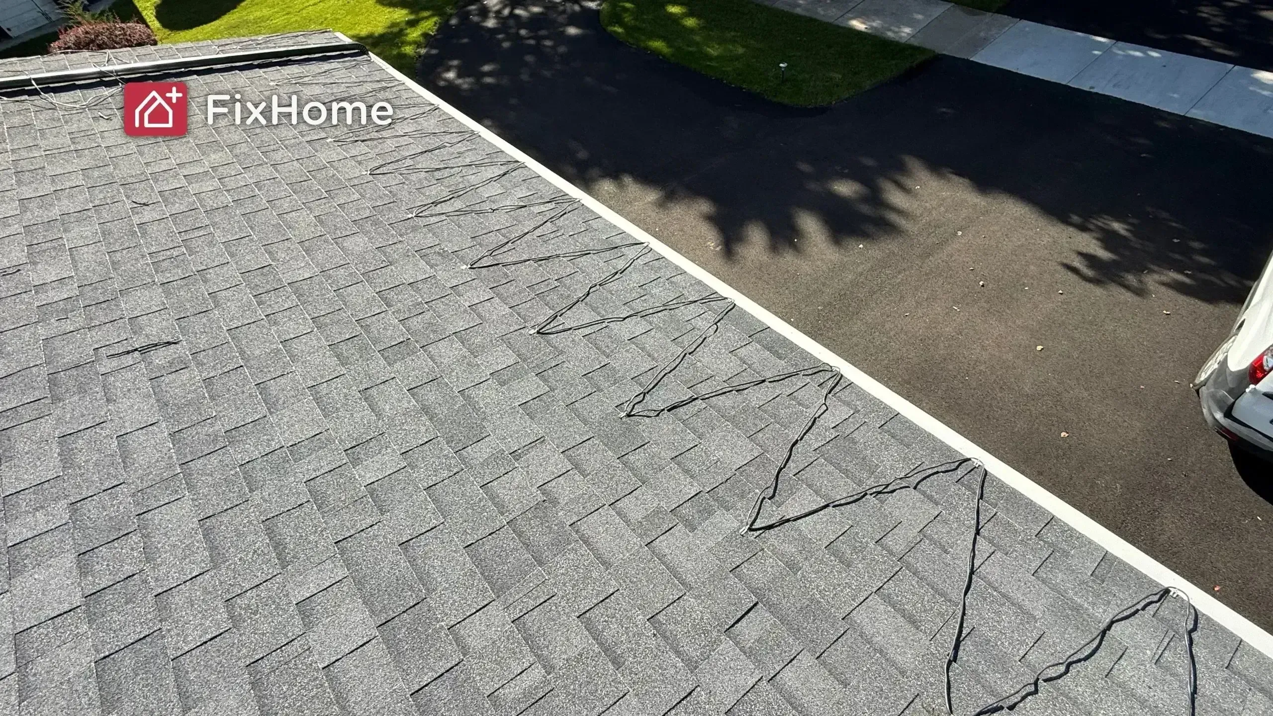 Completed heated roof installation with cable zigzag pattern along the roofline in Deerfield, IL