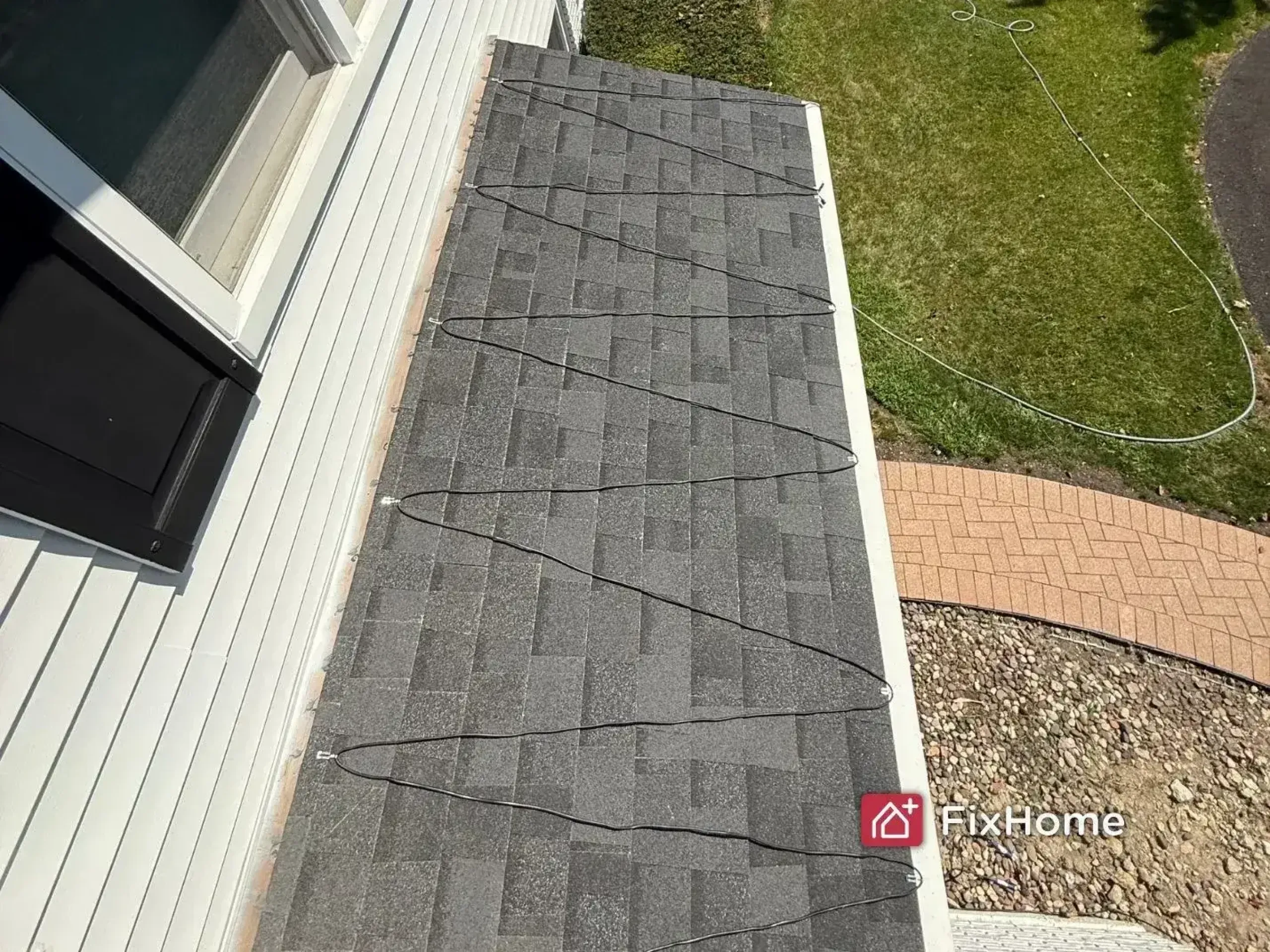 Roof heat cable zigzag pattern installed to prevent ice dams in Deerfield, IL