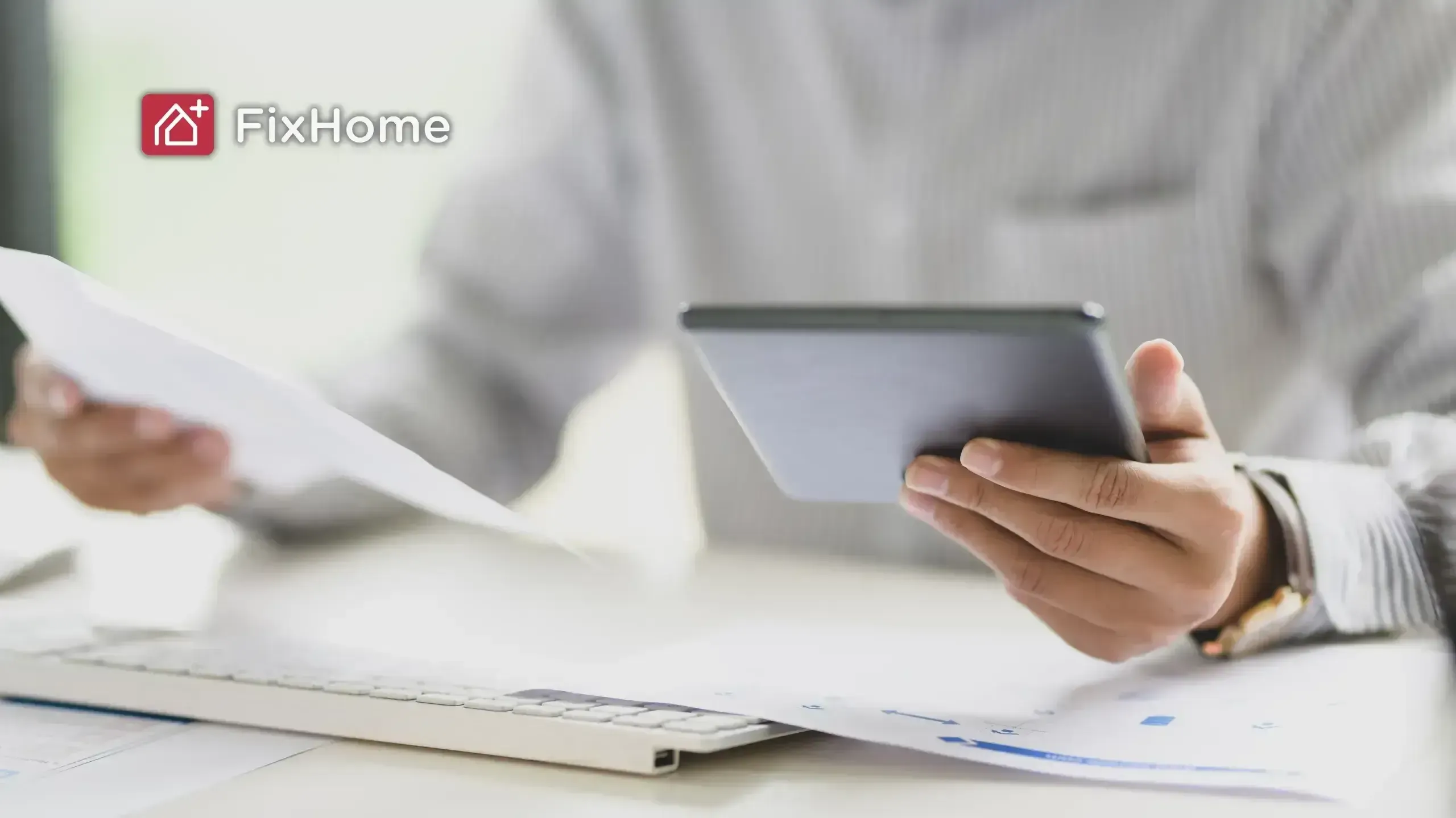 Person holding tablet computer comparing quotes