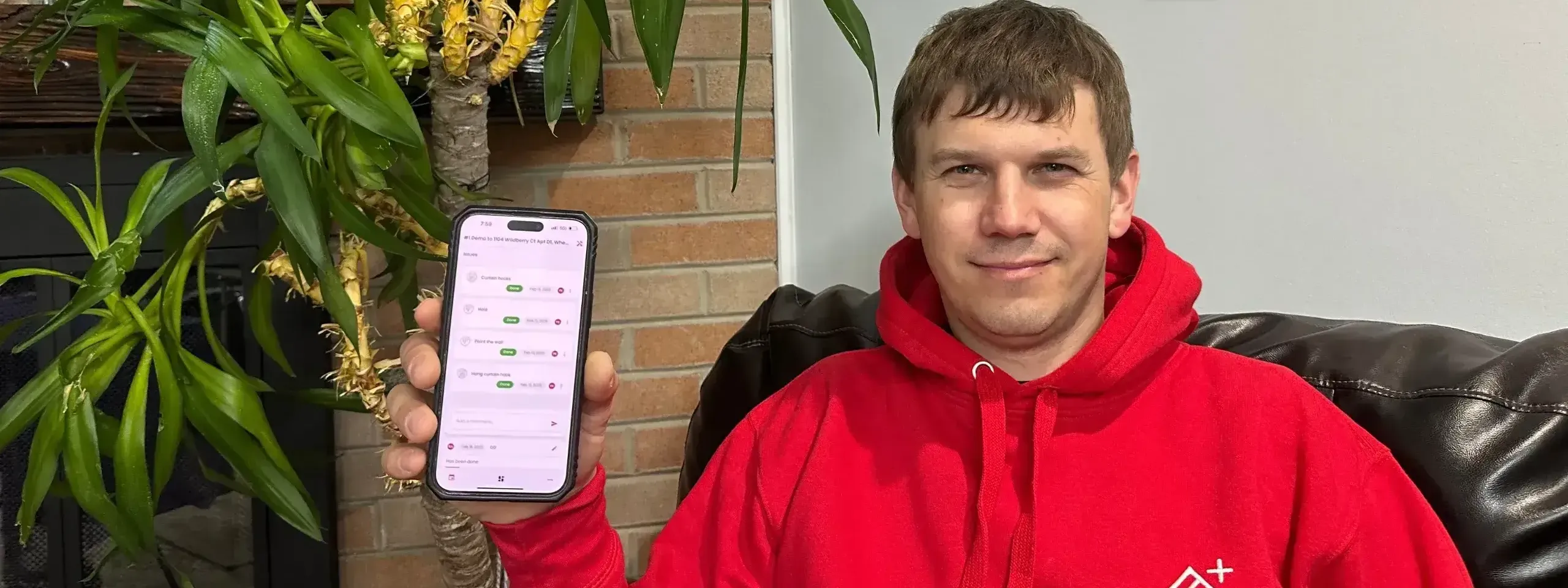 FixHome+ founder Roman shows the completed tasks in the app