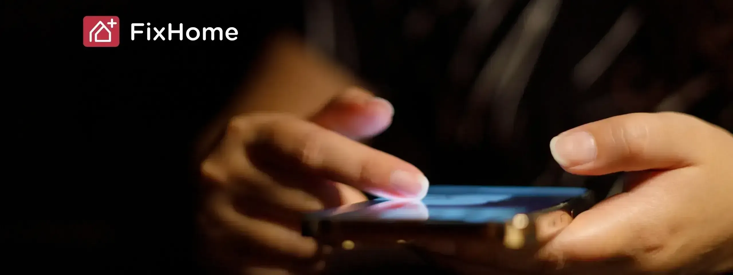 Female hand with phone in the dark space