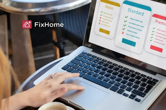 Laptop showing examples of pricing plans