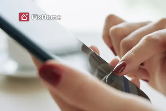 Close up of hands using a smartphone