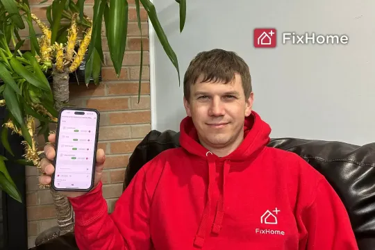 FixHome+ founder Roman shows the completed tasks in the app
