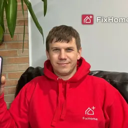 FixHome+ founder Roman shows the completed tasks in the app